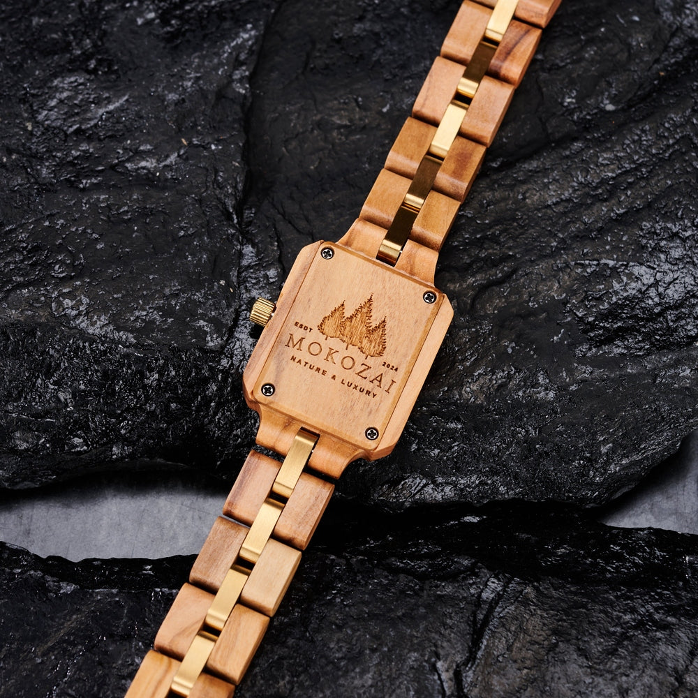 Back view of Mokozai's handcrafted wooden watch showcasing the natural wood grain and engraved logo, highlighting its sustainable and luxurious designโperfect for eco-conscious Australians.