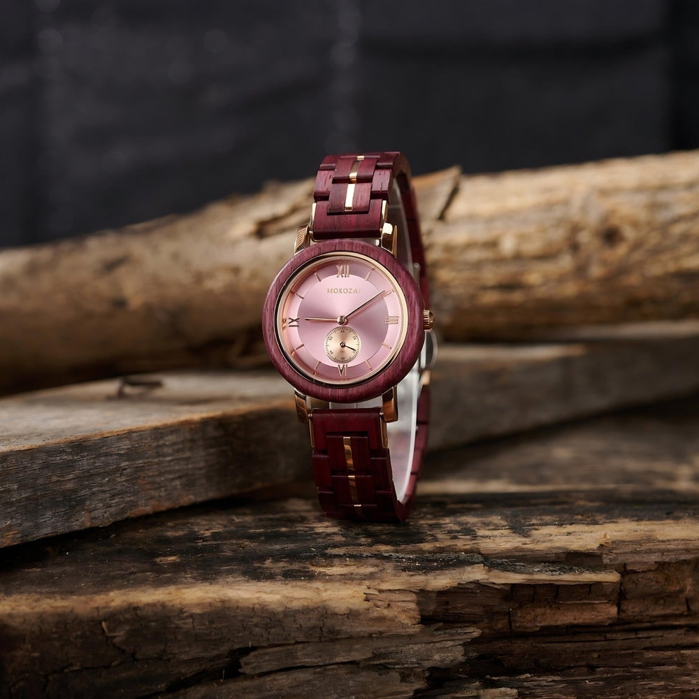 Mokozai women's watch with a purple wood frame and strap, featuring a rose gold case and a soft pink dial. The Roman numeral markers and sub-dial provide a classic touch, while the natural wooden elements emphasize eco-friendly craftsmanship, making it an ideal choice for stylish, environmentally conscious shoppers in Australia.