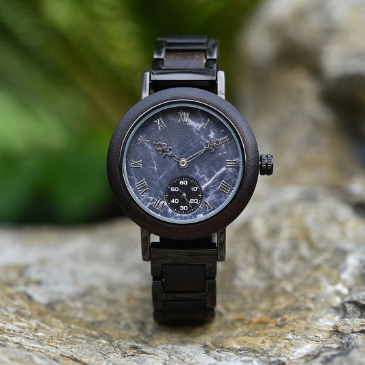 Elegant Mokozai wooden wristwatch featuring a black marble dial with Roman numerals and ornate hands, complemented by a small second subdial. The dark wood frame and metal band create a bold, timeless look perfect for style-conscious Australians.