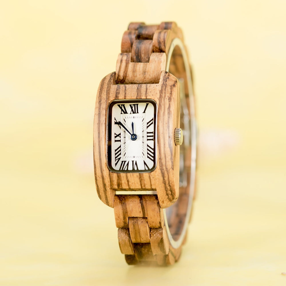 Vintage-inspired Mokozai wooden wristwatch with a rectangular dial featuring Roman numerals, displayed on a light yellow background. The light wood grain on the band enhances the classic design, offering a timeless, eco-friendly style for discerning fashion enthusiasts in Australia.