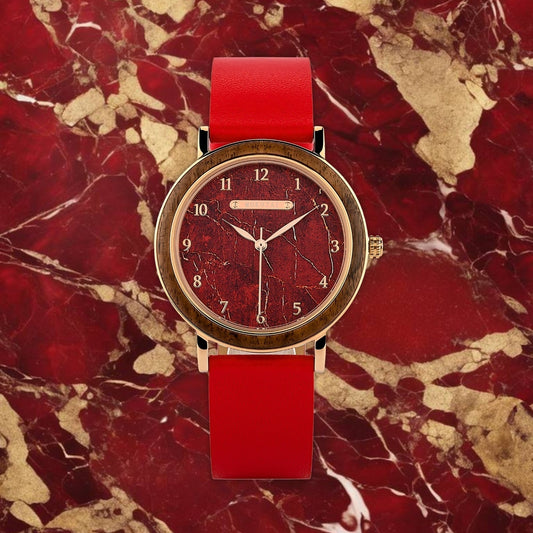 Mokozai wristwatch featuring a bold red marble-textured dial with gold numerals, complemented by a red leather strap, set against a matching red and gold marble background for a striking and luxurious aesthetic.