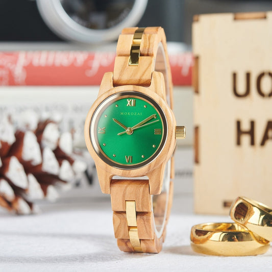 Elegant Mokozai women's wooden watch featuring a vibrant green dial with Roman numerals, set in a light wood case with gold accents. A blend of natural materials and luxury style, perfect for eco-conscious Australians seeking sustainable fashion accessories.