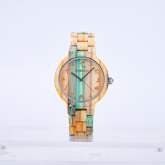 Mokozai wooden wristwatch featuring a multicolored bamboo design with shades of teal, orange, and natural wood tones. The dial displays elegant Asian-inspired numerals and minimalist black watch hands, creating a unique fusion of cultural and eco-friendly style. Ideal for fashion-forward, eco-conscious individuals in Australia.